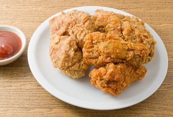 Fried Chicken with Sauce on A White Dish