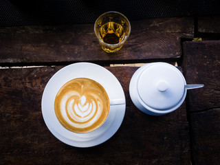 latte coffee on wood with tea