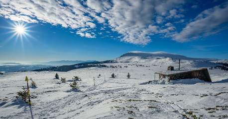 Clear skies and beautiful sunshine in the mountains - amazing winter landscape on a mountain top