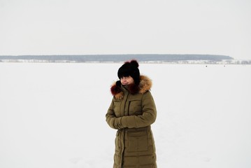 a woman on a winter lake