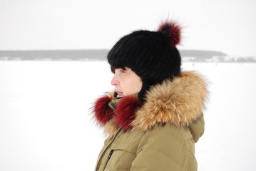 a woman on a winter lake