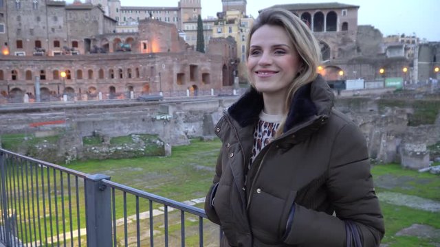 Video of a tourist girl in Ancient Trajan's Market, ruins at Via dei Fori Imperiali, Rome, Italy, Europe
