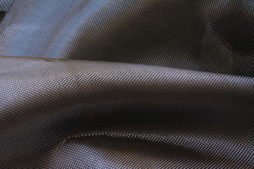 Naklejka premium Carbon fiber composite raw material background