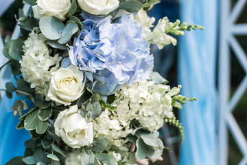 Wedding arch, floral decorations in the garden. Collage