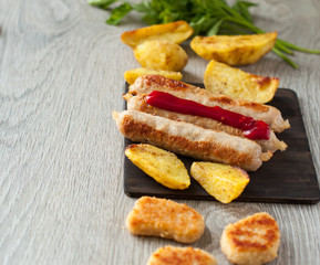grilled sausages and nuggets and chips for lunch. The concept of harmful food