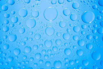 Water drops on blue background