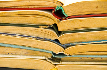 Stack of old open books. Books background