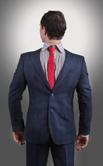 Man wearing his suit on backwards