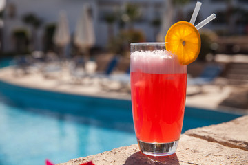 summer cocktail by pool. Delicious beverages