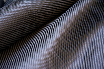 Fototapeta premium Carbon fiber composite raw material background