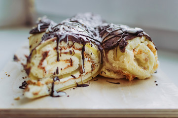 a piece of homemade biscuit cakewith chocolate sprinkles closeup
