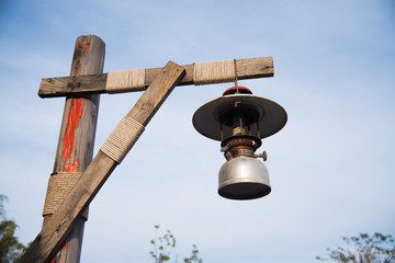 Old lamp lantern hang on garden