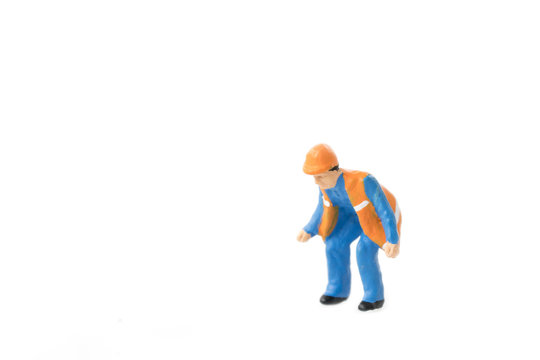 Miniature people engineer worker construction concept