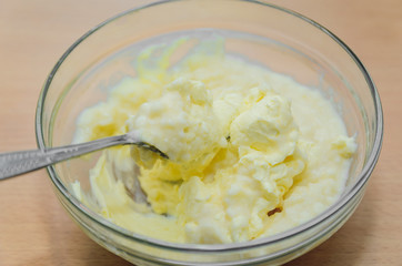 softened butter in a glass dish, cooking home-made cake