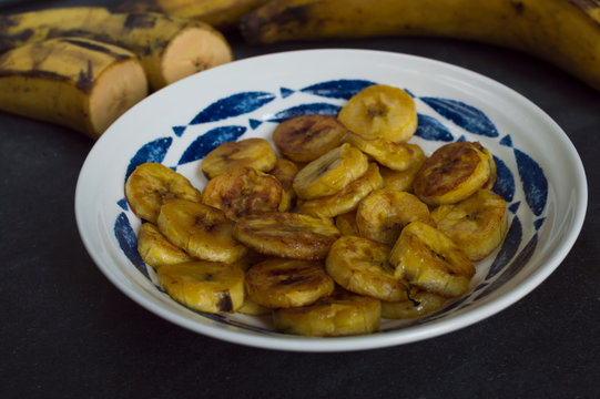 Plantain fried and raw (shallow depth of field)