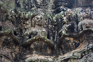 Ancient stone sculptures at The Bayon temple, Angkor, Cambodia