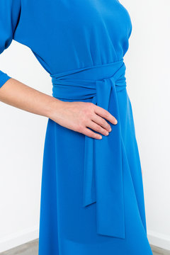 Details of women's clothing. Detail dress on a model on a white background