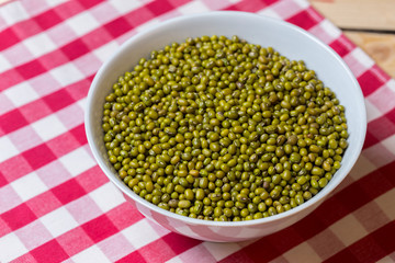 Green bean seed on table.