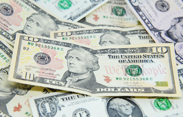 Ten dollars banknote on others
