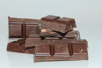 Pieces of a dark chocolate bar