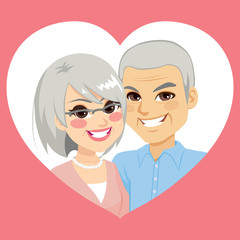 Senior married couple in Saint Valentine day on heart frame in love