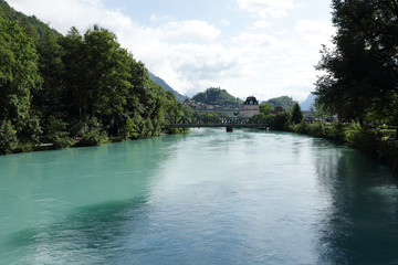 Aare river flowing between lake Thun and Lake Breinz  at Interlaken