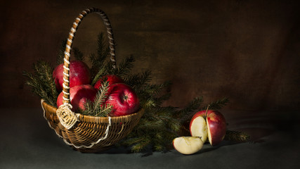 Fototapeta na wymiar still life of apples in the branches of fir