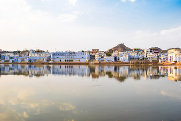 Fototapeta na wymiar Pushkar, Rajasthan . .Cityscape above holy lake Pushkar city, popular tourist town in Ajmer district of India