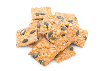 Autumn themed baked crisps with cranberries, nuts and seeds stac