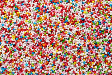 Multicoloured sweet sugar balls. Small ball pattern.