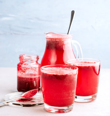 Detox lemonade in glasses with berries