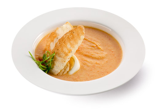 carrot cream soup on the white background