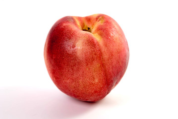 Fototapeta na wymiar Ripe peach fruit isolated