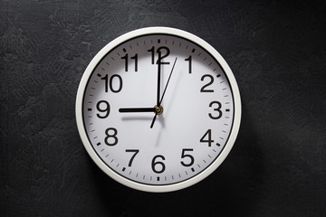 wall clock  at black background