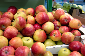 Many red apples in mall on sale closeup shot