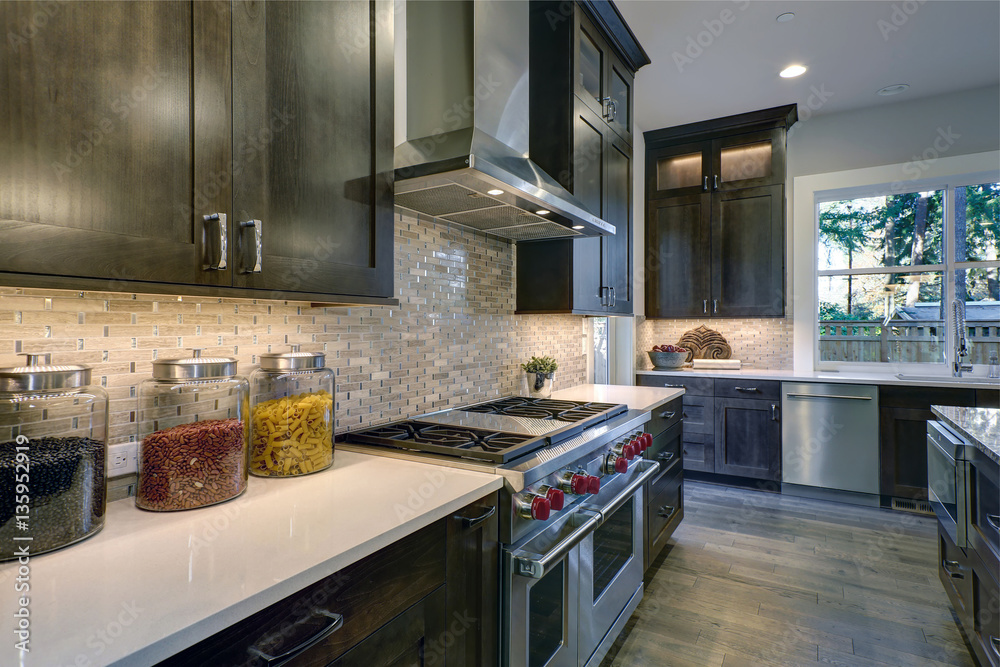 Wall mural Modern kitchen with brown kitchen cabinets