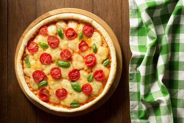 pizza at wooden table