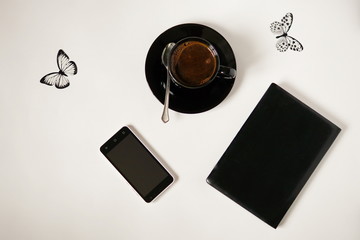 flat lay abstract concept.coffee cell phone notebook 