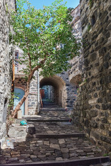 Naklejka premium The narrow street in the picturesque village of Mirabel.in the Ardeche department in France.