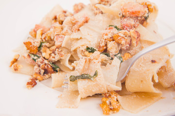 Pasta with cream sauce with nuts