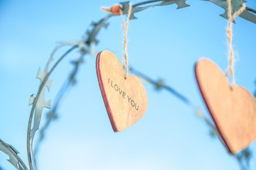 wooden hearts on the prison wall
