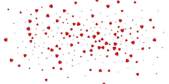 Heart confetti of Valentines petals falling on white background. Flower petals