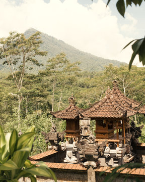 Small Bali Temple in a mountains. Natural photos of local architecture. Photography is colored to make warm muted colors.