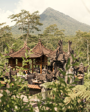 Small Bali Temple in a mountains. Natural photos of local architecture. Photography is colored to make warm muted colors.
