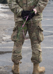 Boleslawiec, Poland, unidentified soldier keeps a rose during the military pickink organized by american and polish soldiers on February 5 in Boleslawiec Poland