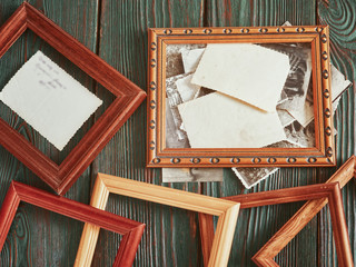 Old photos with a wooden framework on an authentic background
