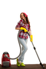 Happy woman cleans with vacuum cleaner isolated over white backg