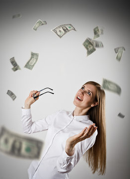 Rejoicing. Woman in white and Dollars.