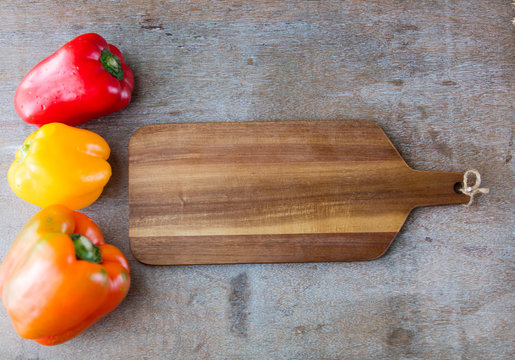 Cooking board and three bell pappers