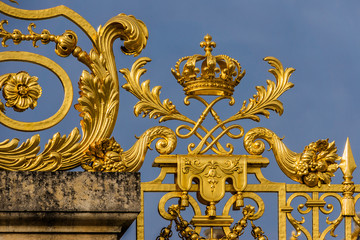 Golden Main Gates of the Versailles Palace. Paris, France.